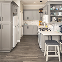 finished kitchen featuring a light gray shaker cabinet door style